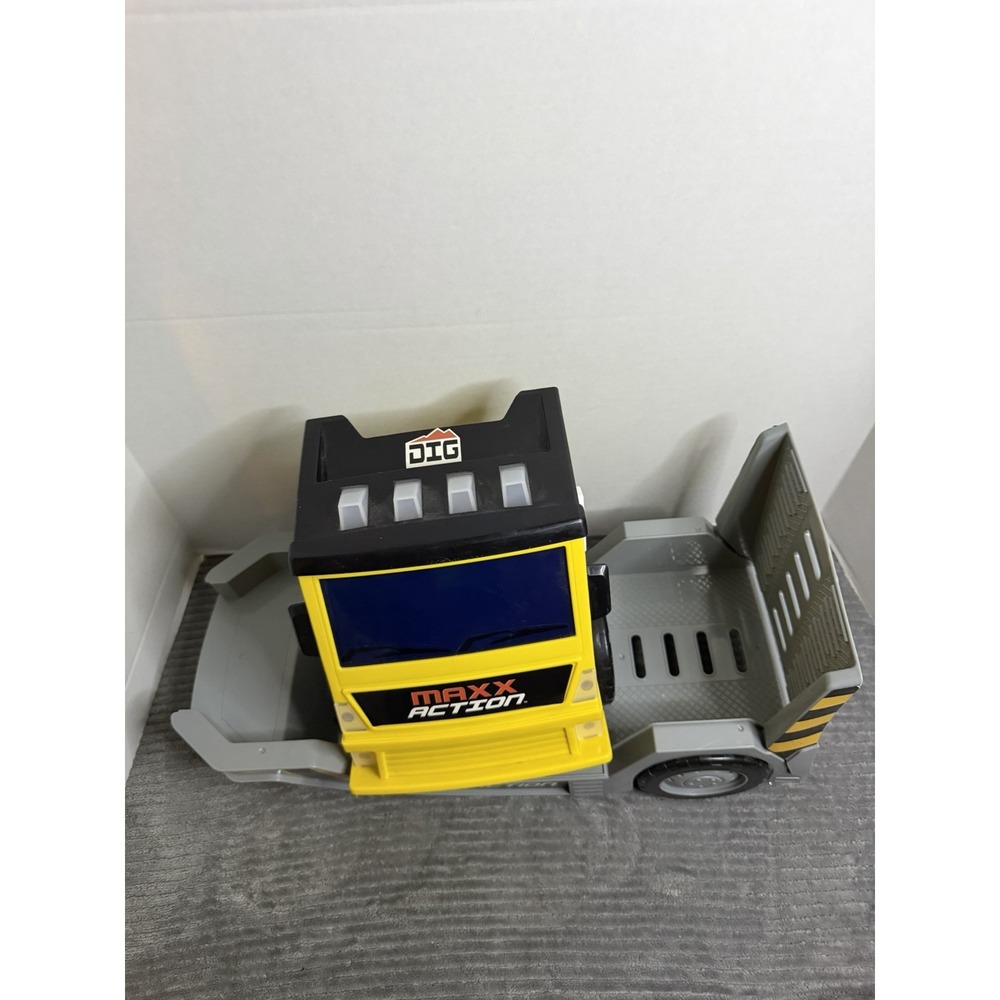 Maxx Action 2-N-1 Mega Mover construction vehicle.